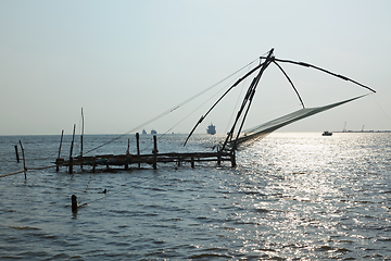 Image showing Chinese fishnets on sunset. Kochi, Kerala, India