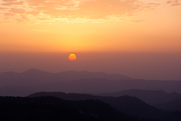 Image showing Sunset in hills