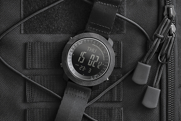 Image showing Tactical watch on backpack