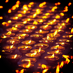 Image showing Burning candles in Buddhist temple, McLeod Ganj