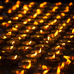 Image showing Burning candles in Buddhist temple. McLeod Ganj, Himachal Prades