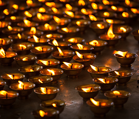 Image showing Burning candles in Buddhist temple, McLeod Ganj