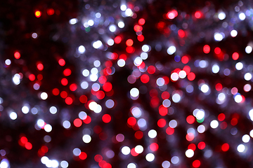 Image showing Colorful festive blurry lights of Christmas decorations