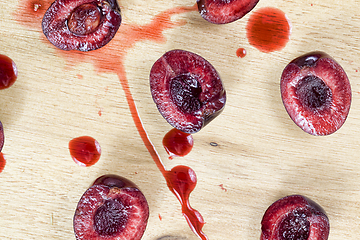 Image showing sliced red sweet cherries