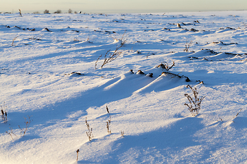 Image showing Snow drifts in winter - snow photographed in the winter season, which appeared after a snowfall. close-up,