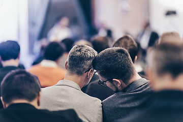 Image showing Round table discussion at business convention and Presentation. Audience at the conference hall. Business and entrepreneurship symposium