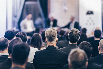 Image showing Round table discussion at business conference meeting event.. Audience at the conference hall. Business and entrepreneurship symposium.