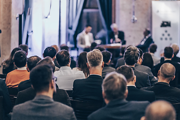 Image showing Round table discussion at business conference event.