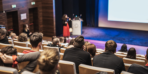 Image showing Woman giving presentation on business conference event.