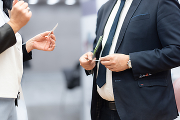 Image showing Business people exchanging business card on business meeting, Business discussion talking deal concept