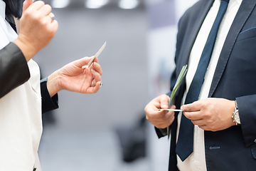 Image showing Business people exchanging business card on business meeting, Business discussion talking deal concept