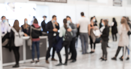 Image showing Abstract blured people at exhibition hall of expo event trade show. Business convention show or job fair. Business concept background.