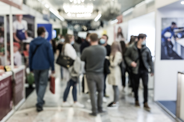 Image showing Abstract blured people at exhibition hall of expo event trade show. Business convention show or job fair. Business concept background.