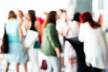 Image showing Blured image of businesspeople at coffee break at conference meeting.