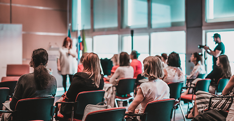 Image showing Woman giving presentation on business conference event.