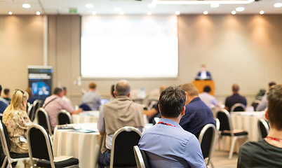 Image showing Business speaker giving a talk at business conference event.