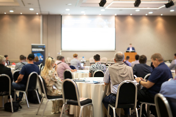 Image showing Business speaker giving a talk at business conference event.