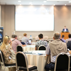 Image showing Business speaker giving a talk at business conference event.