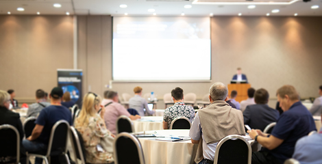 Image showing Business speaker giving a talk at business conference event.