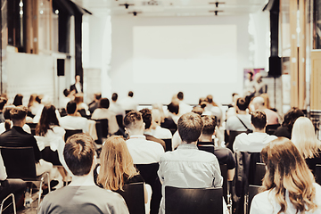 Image showing Business speaker giving a talk at business conference event.