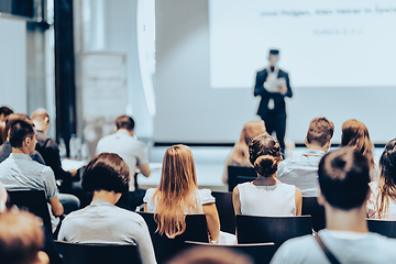 Image showing Business speaker giving a talk at business conference event.