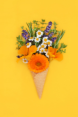 Image showing Summer Flowers in Waffle Ice Cream Cone Surreal Concept