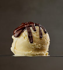 Image showing vanilla ice cream with melted chocolate
