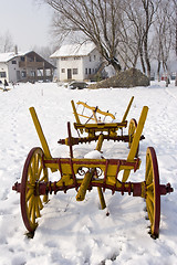 Image showing old farm cart in the snow