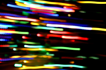 Image showing Abstract bright motion background with blurred lights 