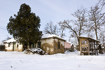 Image showing traditional mud built farmhouse in winter