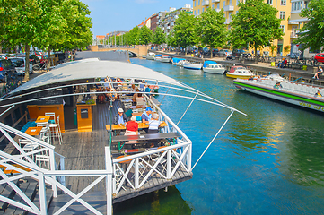 Image showing Copenhagen cityscape, restaurant by canal