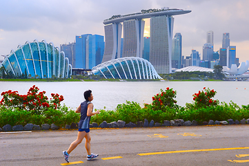 Image showing Man jogging in Singapore bay