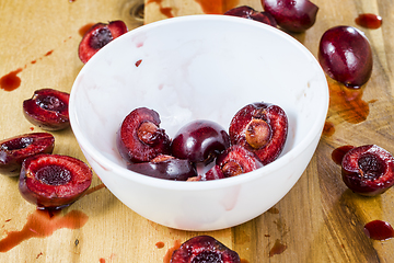 Image showing sliced red sweet cherries