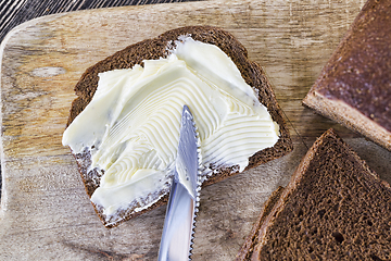 Image showing bread smeared butter