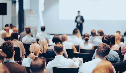 Image showing Business speaker giving a talk at business conference event.