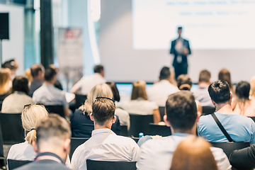 Image showing Business speaker giving a talk at business conference event.