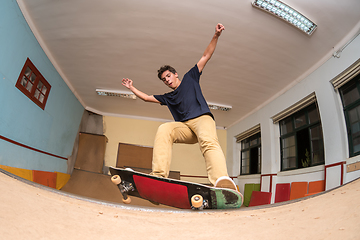 Image showing Skateboarder performing a trick