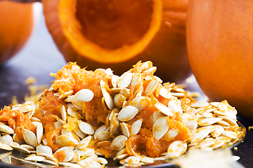 Image showing sliced and gutted orange pumpkin