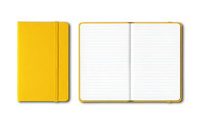 Image showing Yellow closed and open lined notebooks isolated on white