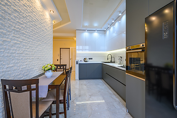 Image showing Luxury white and dark grey modern kitchen interior