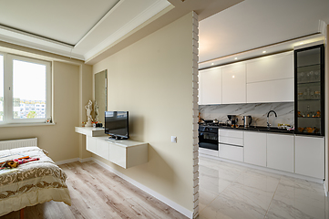 Image showing Modern studio apartment with white kitchen in classic style