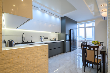 Image showing Luxury white and dark grey modern kitchen interior