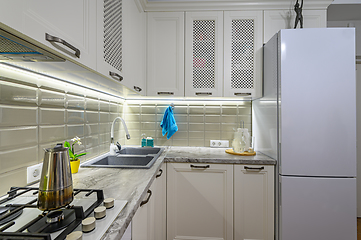 Image showing White kitchen in classic style