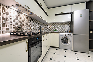Image showing Black and white modern kitchen interior