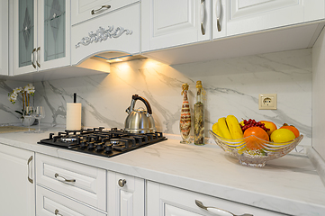 Image showing White kitchen in classic style, front view