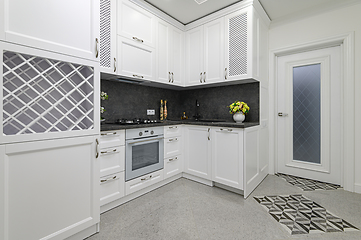 Image showing Luxury well designed modern black and white kitchen