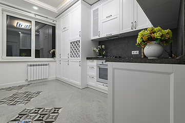 Image showing Luxury well designed modern black and white kitchen