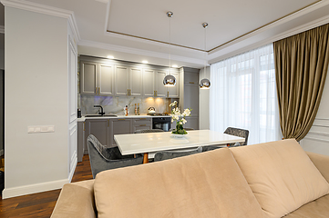 Image showing Luxury gray and white luxury kitchen in modern style