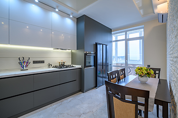 Image showing Luxury white and dark grey modern kitchen interior