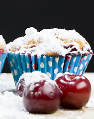 Image showing cherry muffins in white sugar